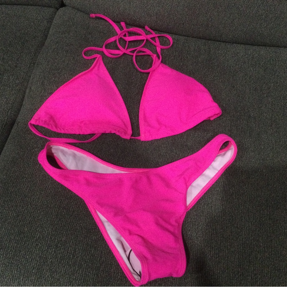 NWT two piece swim suit never worn. Beautiful hot pink